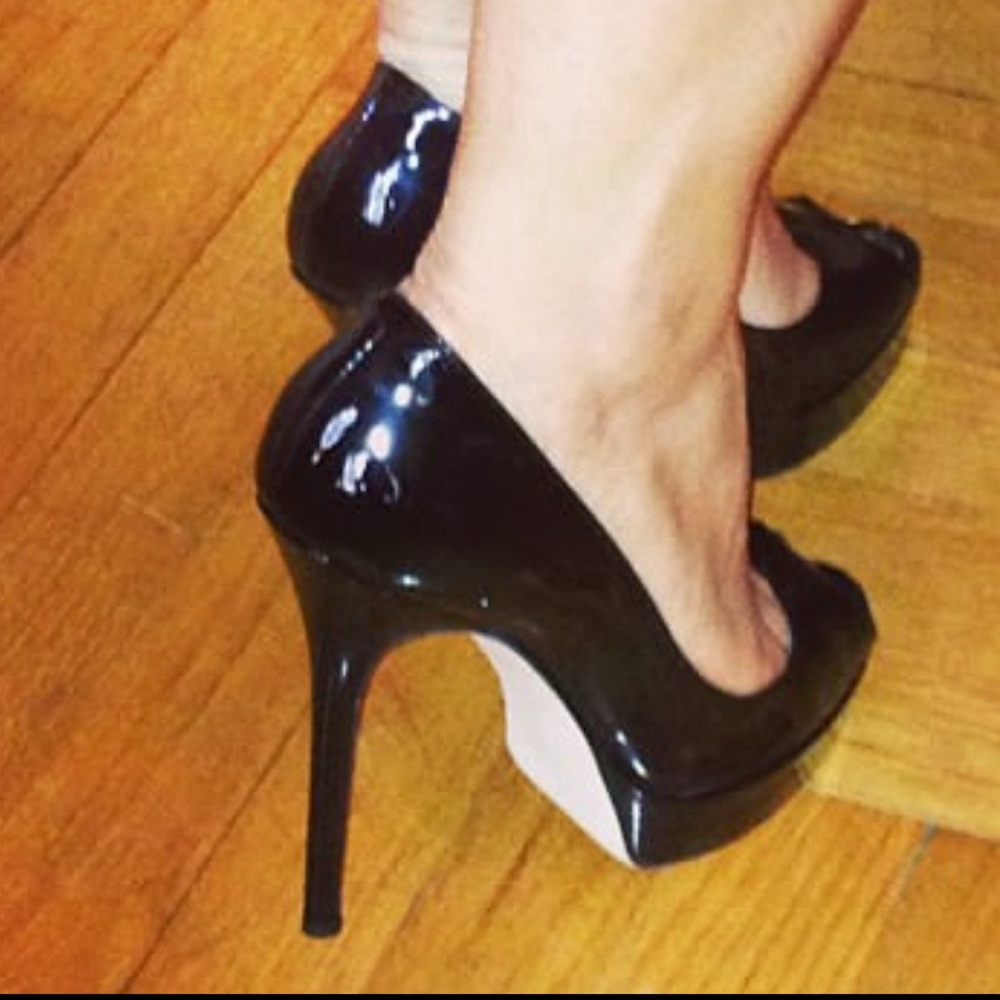 Black patent peep toe pumps